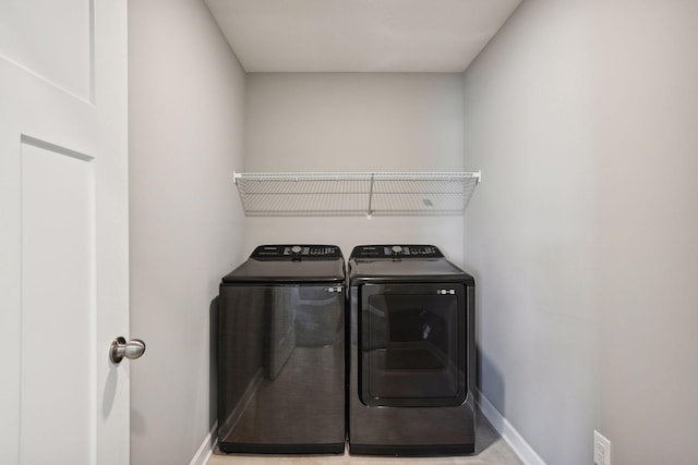 laundry room featuring washer and dryer