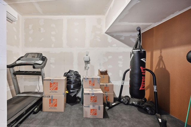 workout room with a wall unit AC