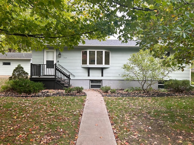 view of front of home with a front yard