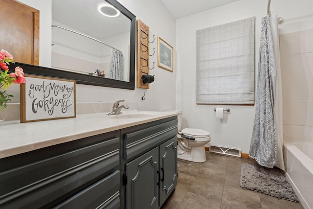 full bath featuring tile patterned flooring, visible vents, vanity, and toilet