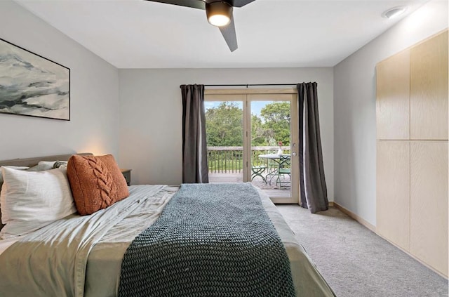 bedroom with light carpet, baseboards, ceiling fan, and access to exterior