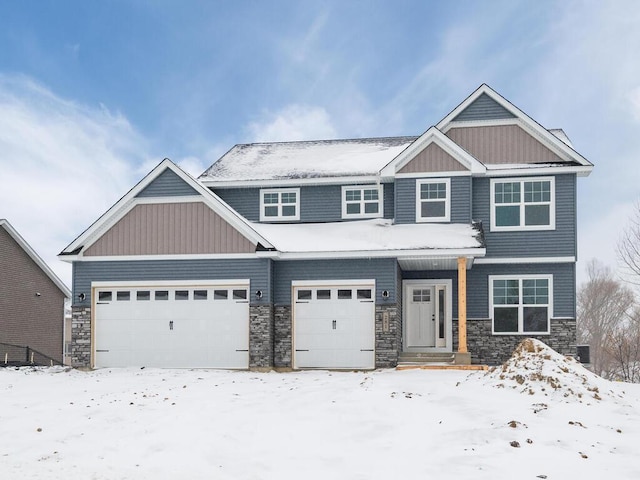 craftsman house with a garage