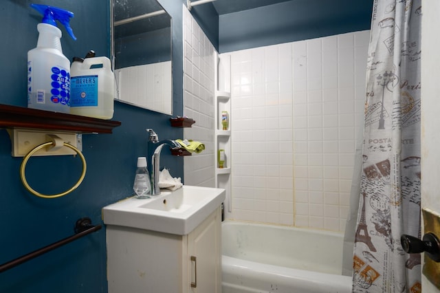 bathroom with vanity and shower / bath combo