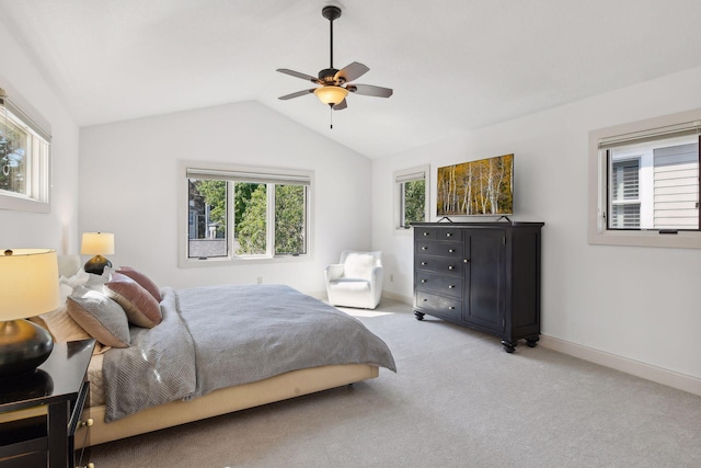 bedroom featuring carpet, ceiling fan, lofted ceiling, and baseboards