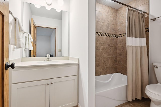 full bathroom featuring toilet, tile patterned floors, shower / bath combination with curtain, and vanity