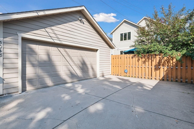 detached garage with fence