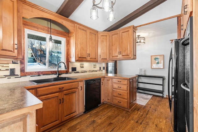 kitchen featuring lofted ceiling with beams, a sink, black dishwasher, tasteful backsplash, and a chandelier