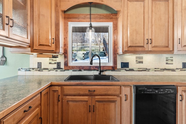 kitchen featuring a sink, glass insert cabinets, backsplash, and dishwasher