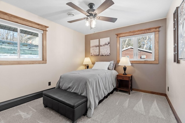 bedroom with visible vents, baseboards, a ceiling fan, and carpet flooring