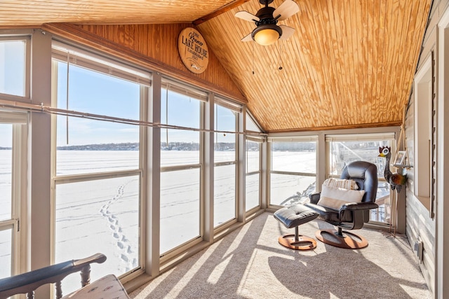 sunroom featuring lofted ceiling, plenty of natural light, and wooden ceiling