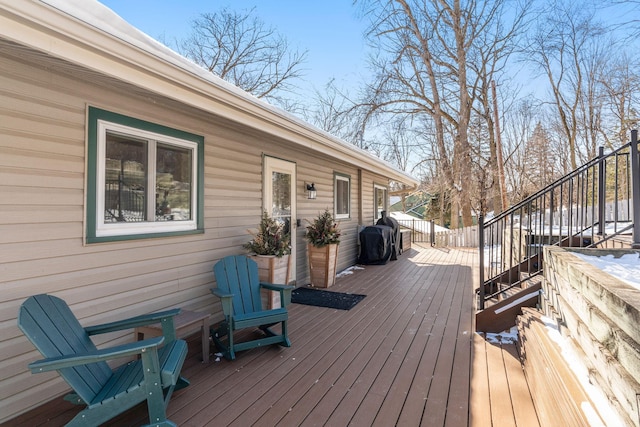 wooden deck with area for grilling