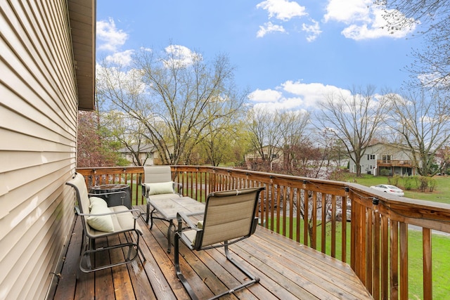 deck featuring a lawn