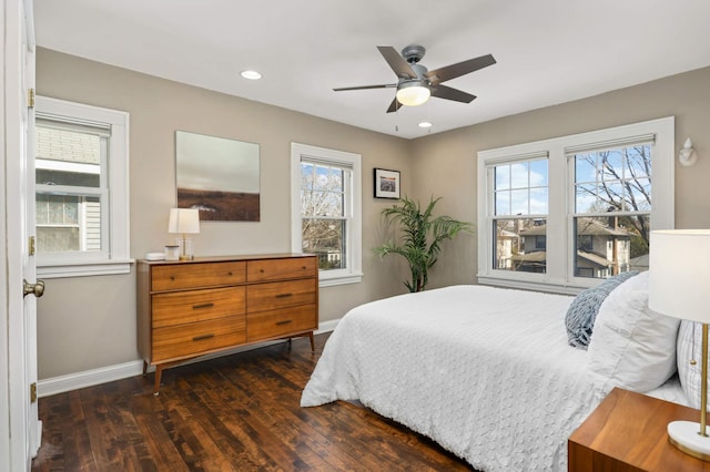 bedroom featuring recessed lighting, dark wood-style floors, baseboards, and ceiling fan