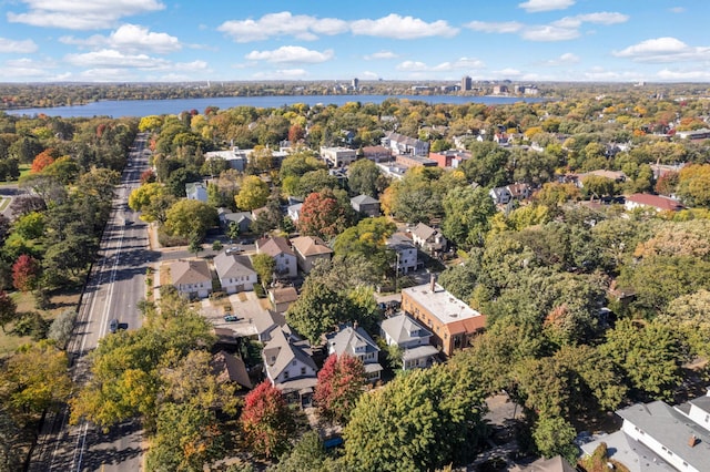 aerial view featuring a residential view and a water view