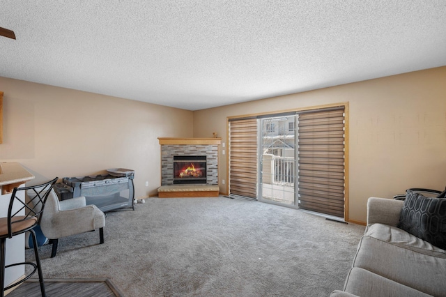 living room featuring a textured ceiling and light carpet