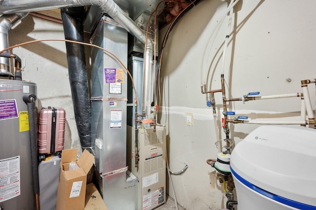 utility room with gas water heater