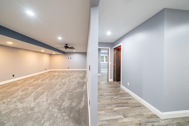 interior space with light wood-style floors, ceiling fan, baseboards, and recessed lighting