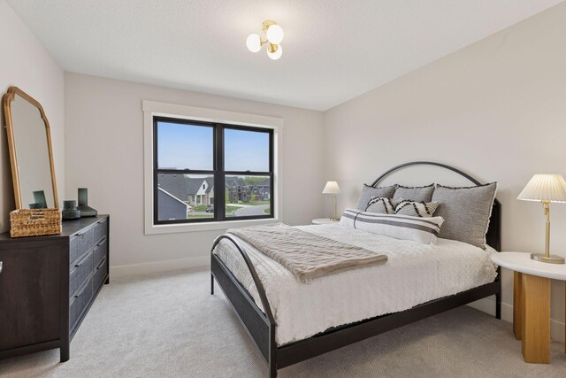 5455 Rolling Hills Pkwy, Victoria, MN 55318 - bedroom with light colored carpet and baseboards