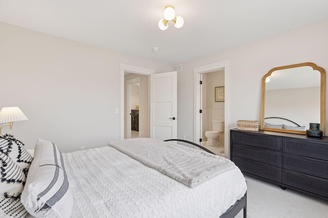 5455 Rolling Hills Pkwy, Victoria, MN 55318 - bedroom with ensuite bath and light colored carpet