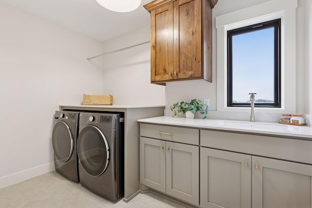 5455 Rolling Hills Pkwy, Victoria, MN 55318 - washroom with washer and dryer, cabinet space, and baseboards
