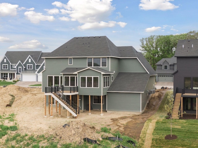 5455 Rolling Hills Pkwy, Victoria, MN 55318 - back of house with stairway, a deck, and roof with shingles