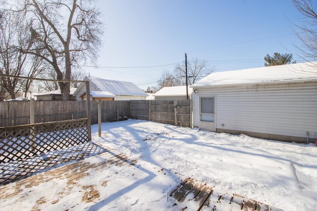 view of yard covered in snow