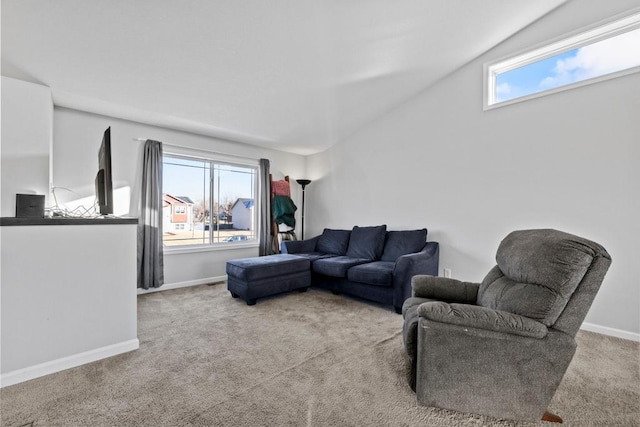 living room featuring light colored carpet and a healthy amount of sunlight