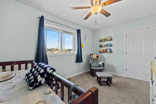 bedroom with light colored carpet and ceiling fan