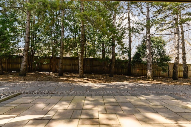 view of patio with fence