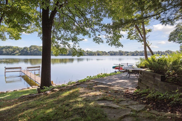 view of dock with a water view