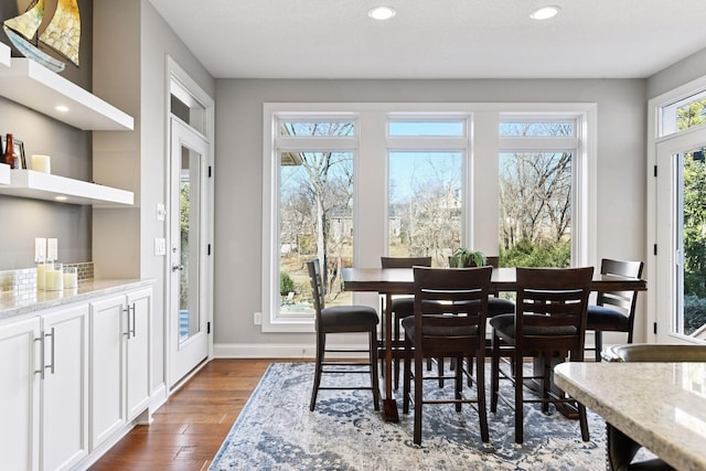 221 George St, Excelsior, MN 55331 - dining space featuring dark wood-type flooring, recessed lighting, and baseboards