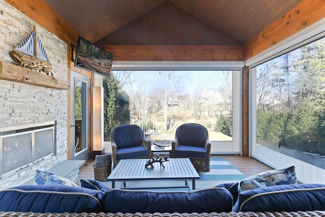221 George St, Excelsior, MN 55331 - living room featuring hardwood / wood-style flooring, vaulted ceiling, wood ceiling, and an outdoor stone fireplace