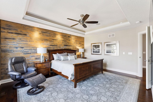 221 George St, Excelsior, MN 55331 - bedroom with a raised ceiling, wood finished floors, baseboards, ceiling fan, and wood walls