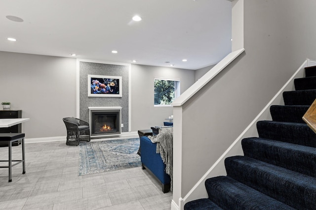 221 George St, Excelsior, MN 55331 - living area featuring stairs, recessed lighting, a fireplace, and baseboards