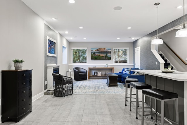 221 George St, Excelsior, MN 55331 - living area with stairway, recessed lighting, and baseboards