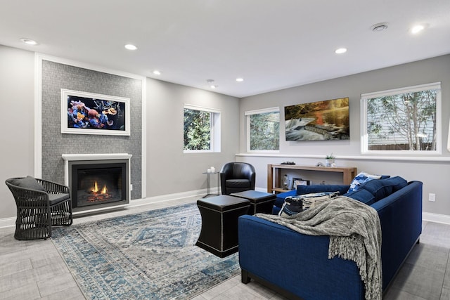 221 George St, Excelsior, MN 55331 - living area with a glass covered fireplace, recessed lighting, and baseboards