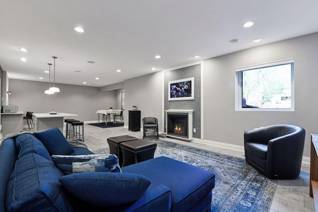 221 George St, Excelsior, MN 55331 - living area featuring recessed lighting, a large fireplace, and baseboards