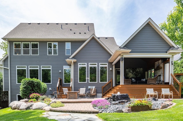 221 George St, Excelsior, MN 55331 - rear view of house with a patio area and roof with shingles