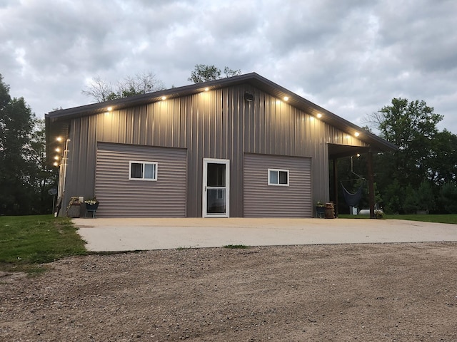 exterior space with a detached garage