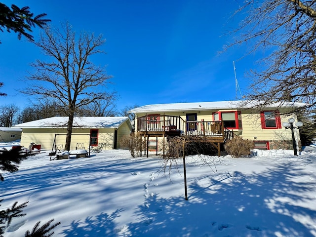 view of front of property with a deck