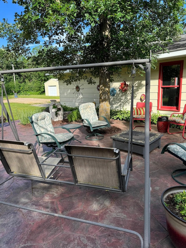 view of patio / terrace with a storage unit