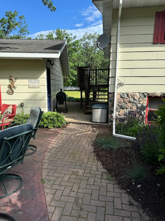 view of patio with a grill