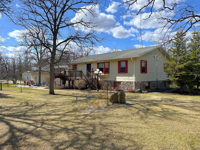 view of front of house featuring a wooden deck and stairway