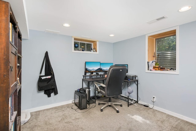 carpeted home office featuring baseboards, visible vents, and recessed lighting