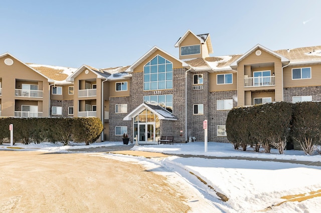 view of snow covered property