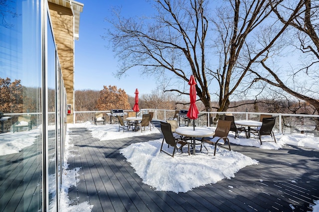 view of snow covered deck