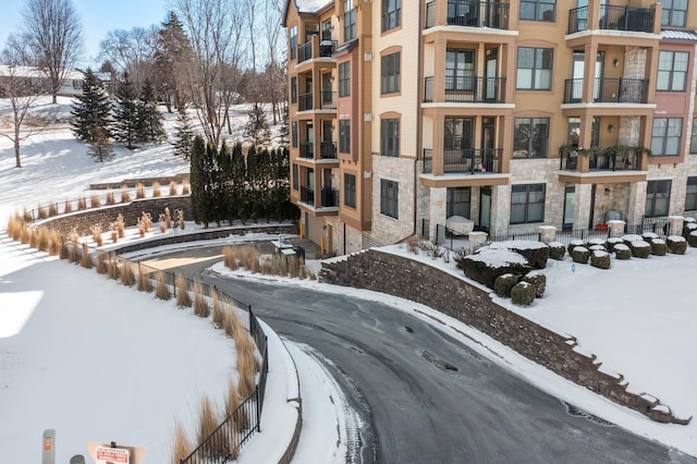 view of snow covered property