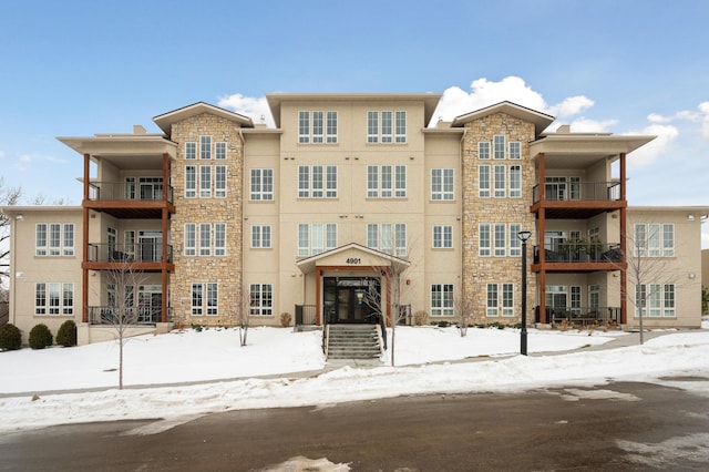 view of snow covered property