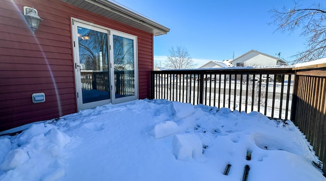 view of snow covered deck