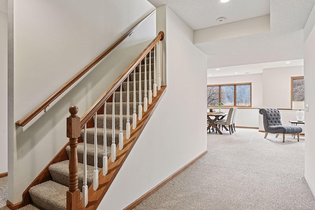 stairway featuring carpet flooring, recessed lighting, and baseboards